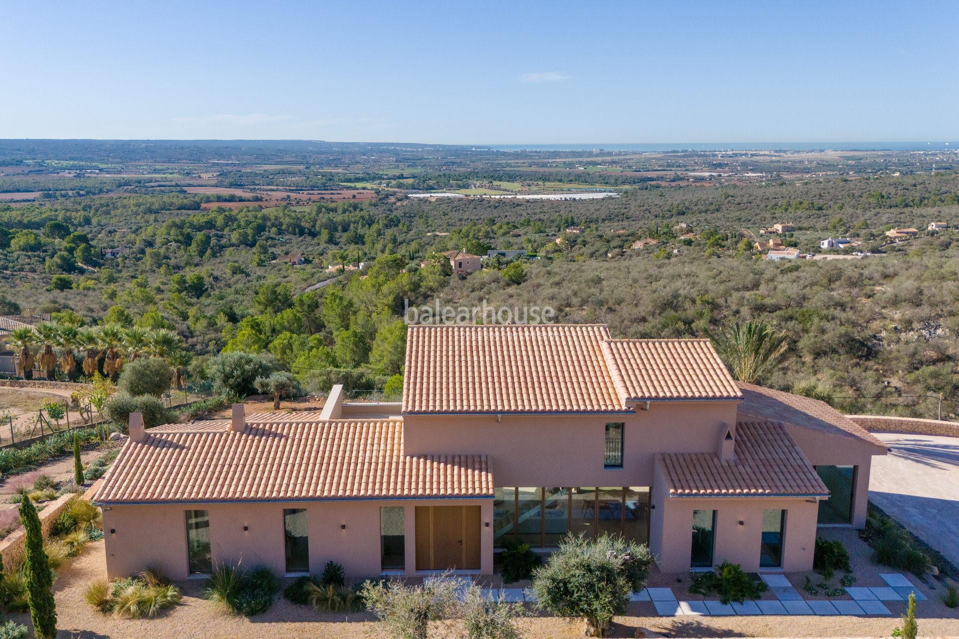 Moderna finca rústica de obra nueva con grandes exteriores y espectaculares vistas a Palma y al mar