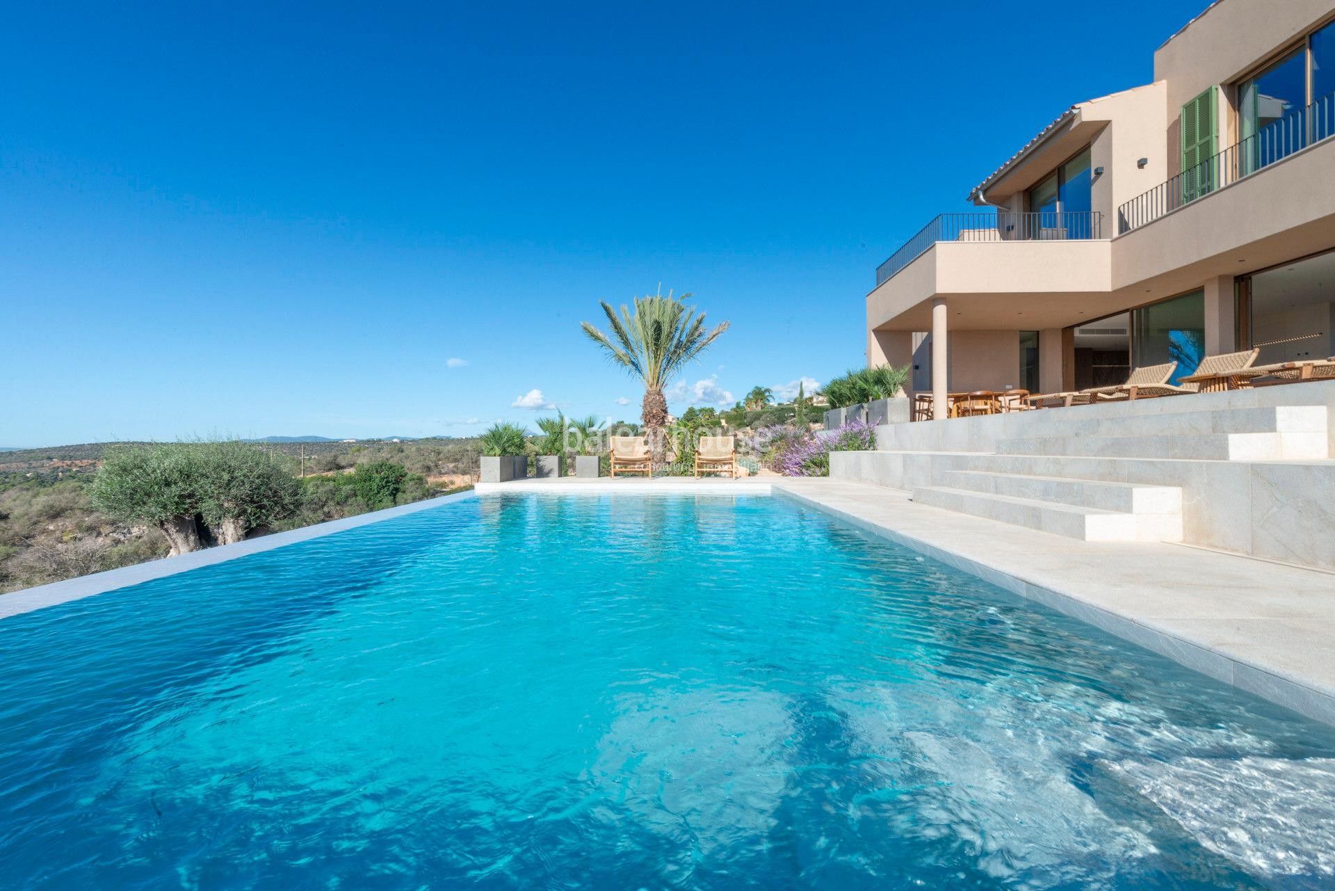 Modern newly built rustic finca with large exteriors and spectacular views of Palma and the sea.